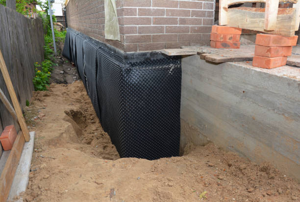 Happy homeowners after waterproofing job in South Orange
